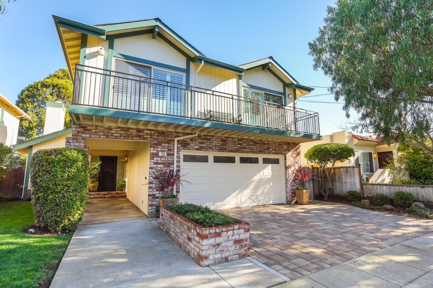 30 Bancroft Road Burlingame, CA 94010 - Photo 3 of 42 a front view of a house with garden