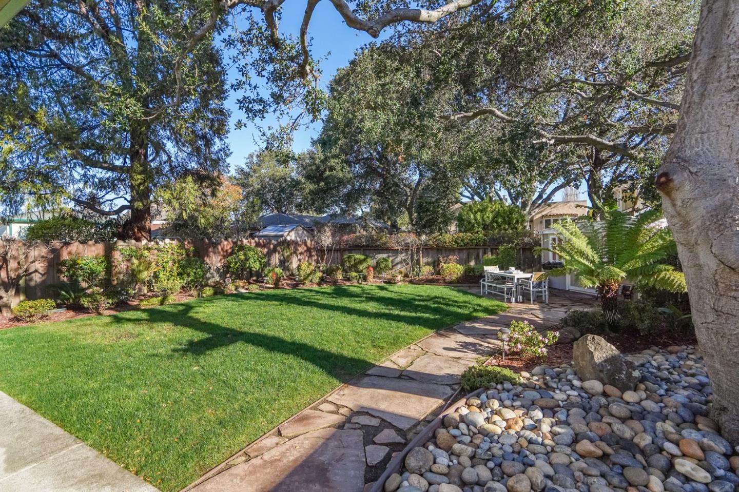 30 Bancroft Road Burlingame, CA 94010 - Photo 35 of 42 a view of a park with large trees