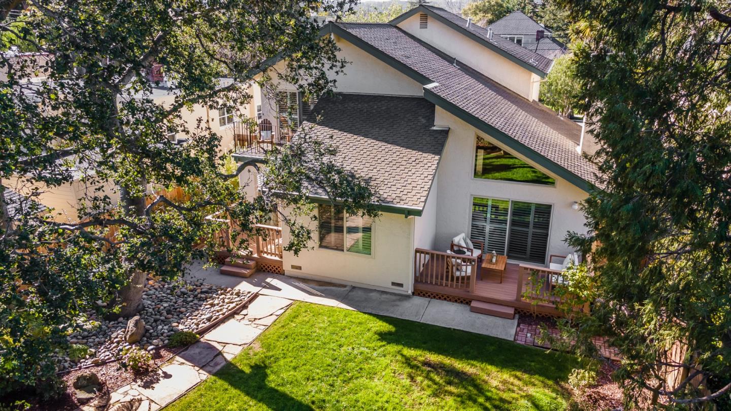 30 Bancroft Road Burlingame, CA 94010 - Photo 5 of 42 a backyard of a house with yard table and chairs