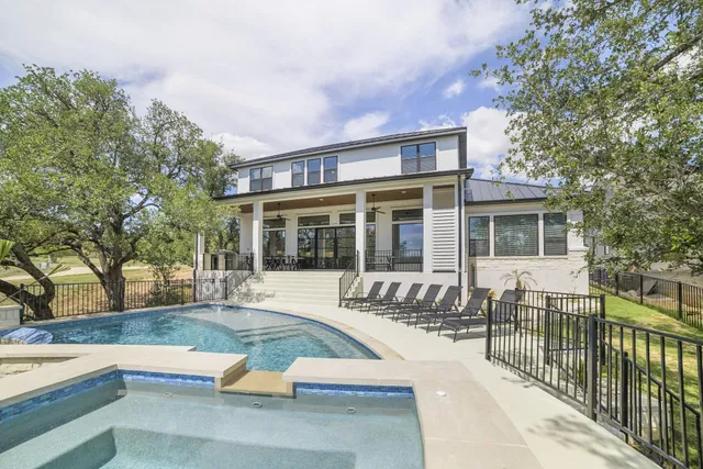 a view of house with outdoor seating
