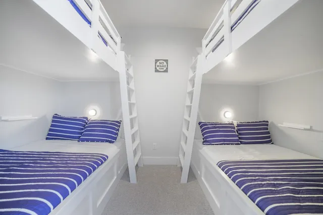 a view of bedroom and wooden floor