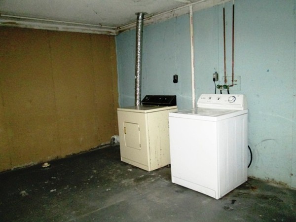 64 Tennis Plaza Road, Unit 2 Dracut, MA 01826 - Photo 13 of 20 a utility room with dryer and washer