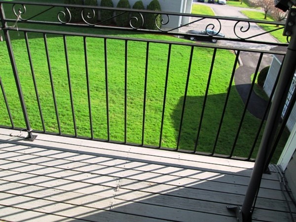 64 Tennis Plaza Road, Unit 2 Dracut, MA 01826 - Photo 15 of 20 a view of a street sign