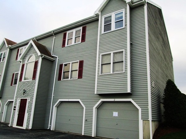64 Tennis Plaza Road, Unit 2 Dracut, MA 01826 - Photo 18 of 20 a front view of a house