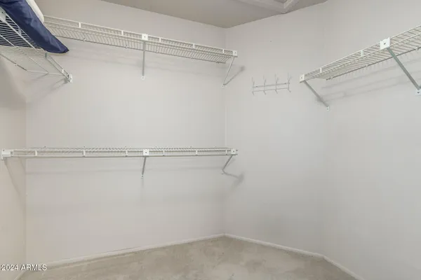 a view of a room with racks on the wall