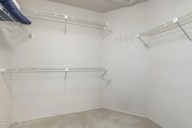 a view of a room with racks on the wall