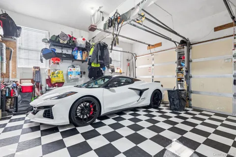 a bedroom with a bed and a sink