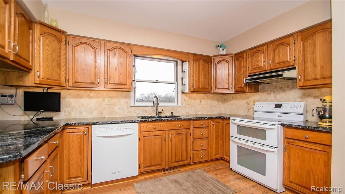 2322 Mooreville Road Milan, MI 48160 - Photo 19 of 78 Endless cabinets and counter top space