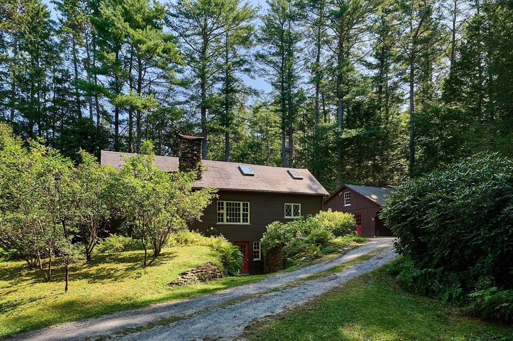 5 Woodward Road Buckland, MA 01370 - Photo 23 of 40 front view of a house with a yard