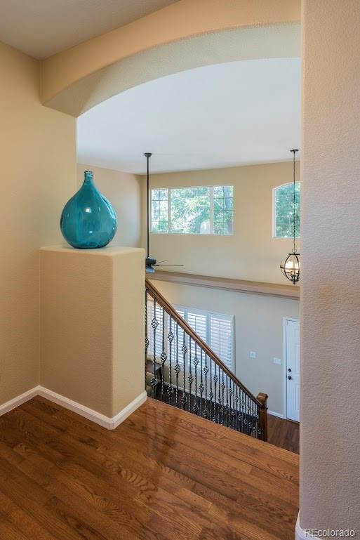 1279 Braewood Avenue Highlands Ranch, CO 80129 - Photo 12 of 20 a view of entryway with a wooden floor