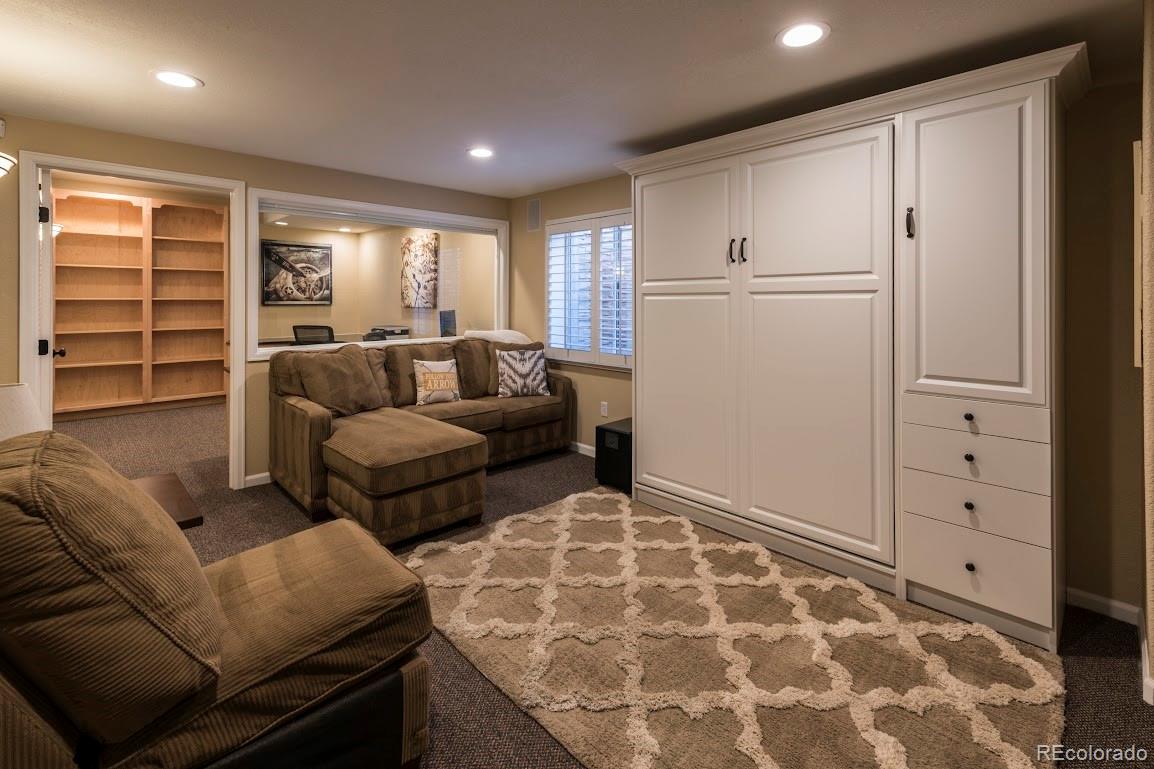 1279 Braewood Avenue Highlands Ranch, CO 80129 - Photo 3 of 20 a living room with furniture and a window