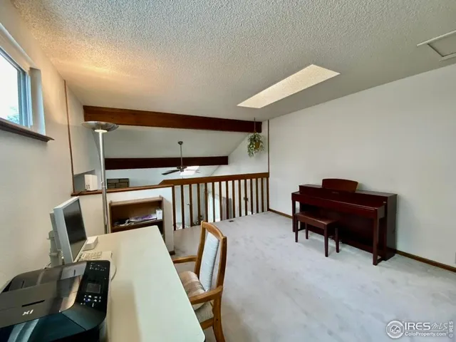 a room with furniture and a window