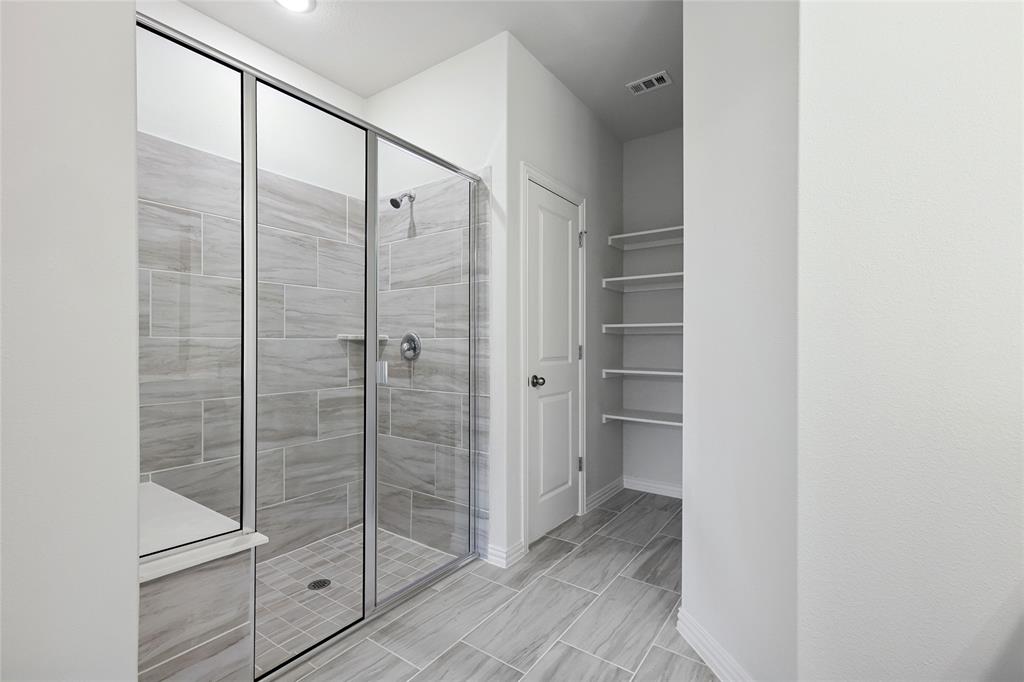 3900 Coco Lane Sherman, TX 75090 - Photo 13 of 40 Bathroom with a shower with door
