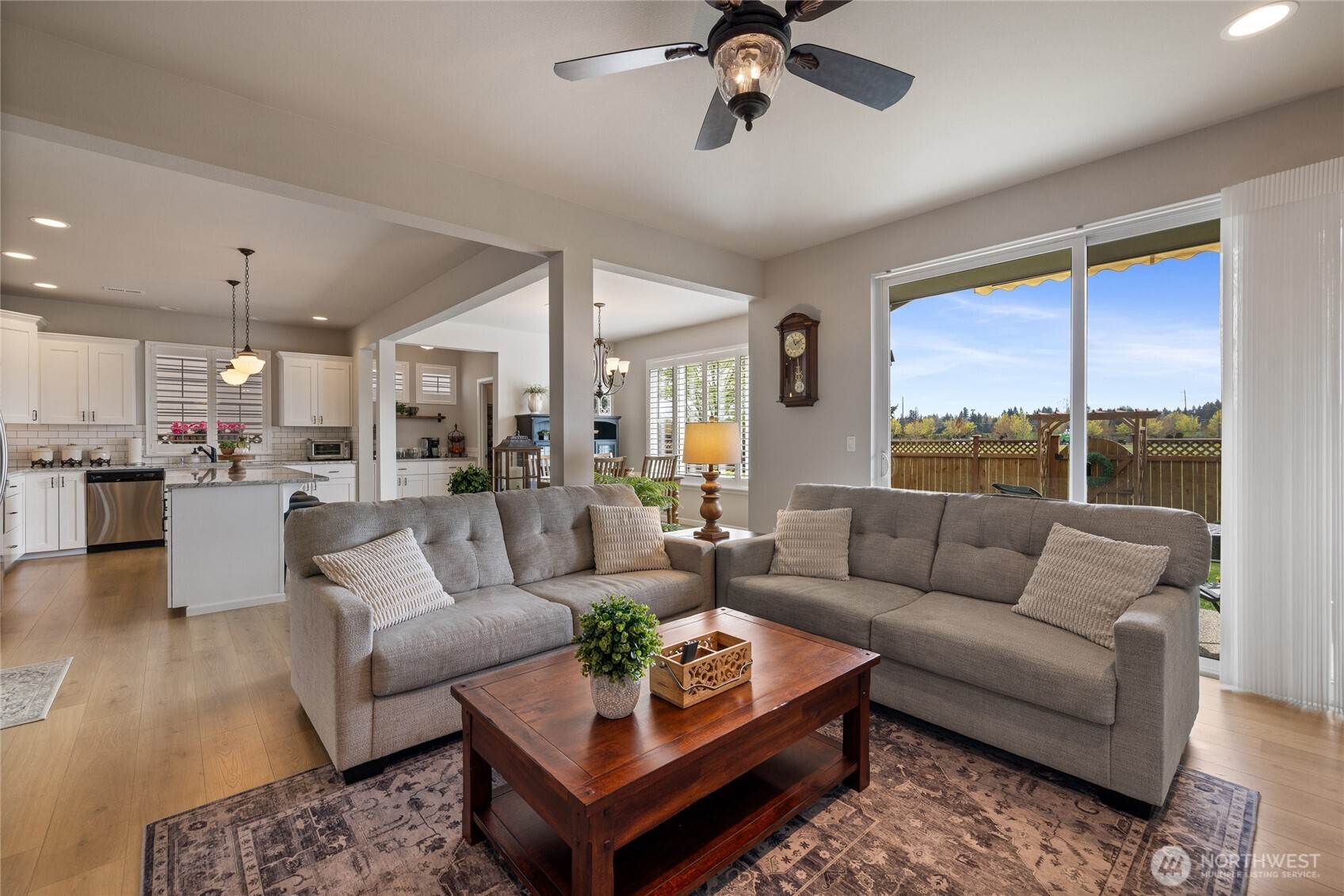5641 Parquet Way Southeast Lacey, WA 98513 - Photo 12 of 39 a living room with furniture and a large window