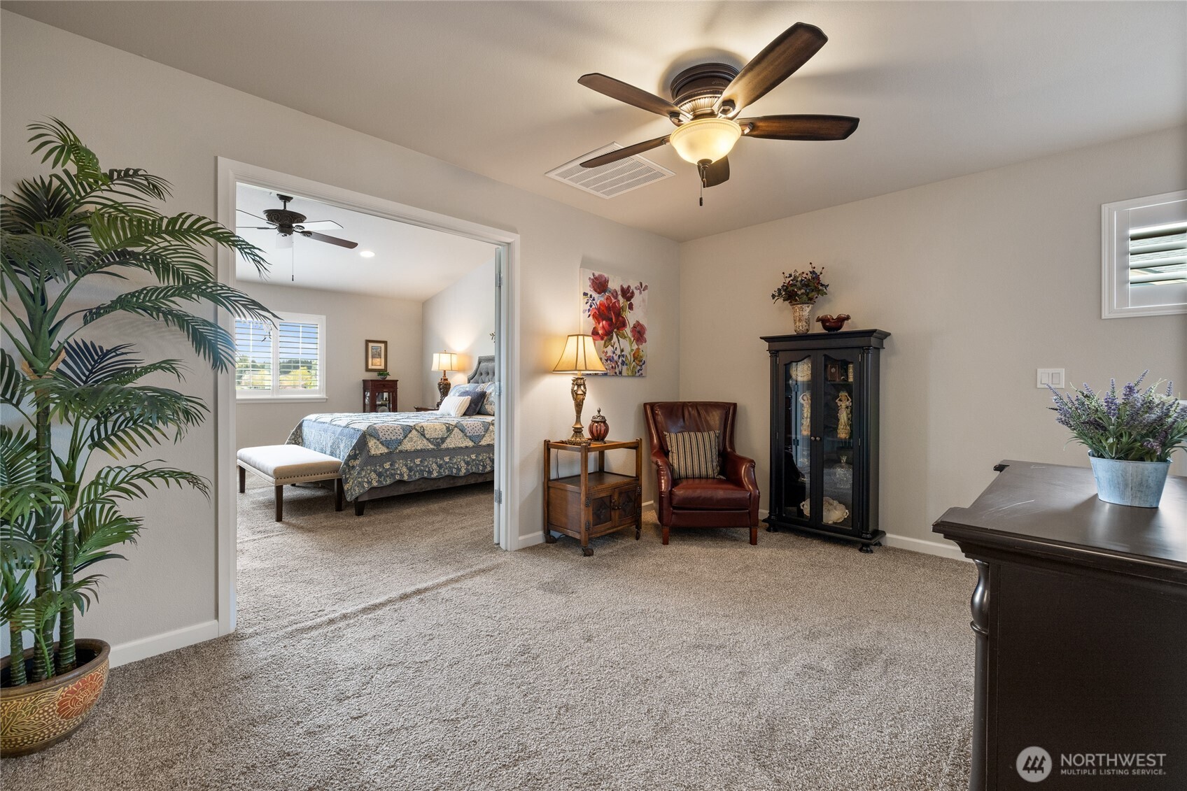 5641 Parquet Way Southeast Lacey, WA 98513 - Photo 22 of 39 a living room with furniture and a potted plant