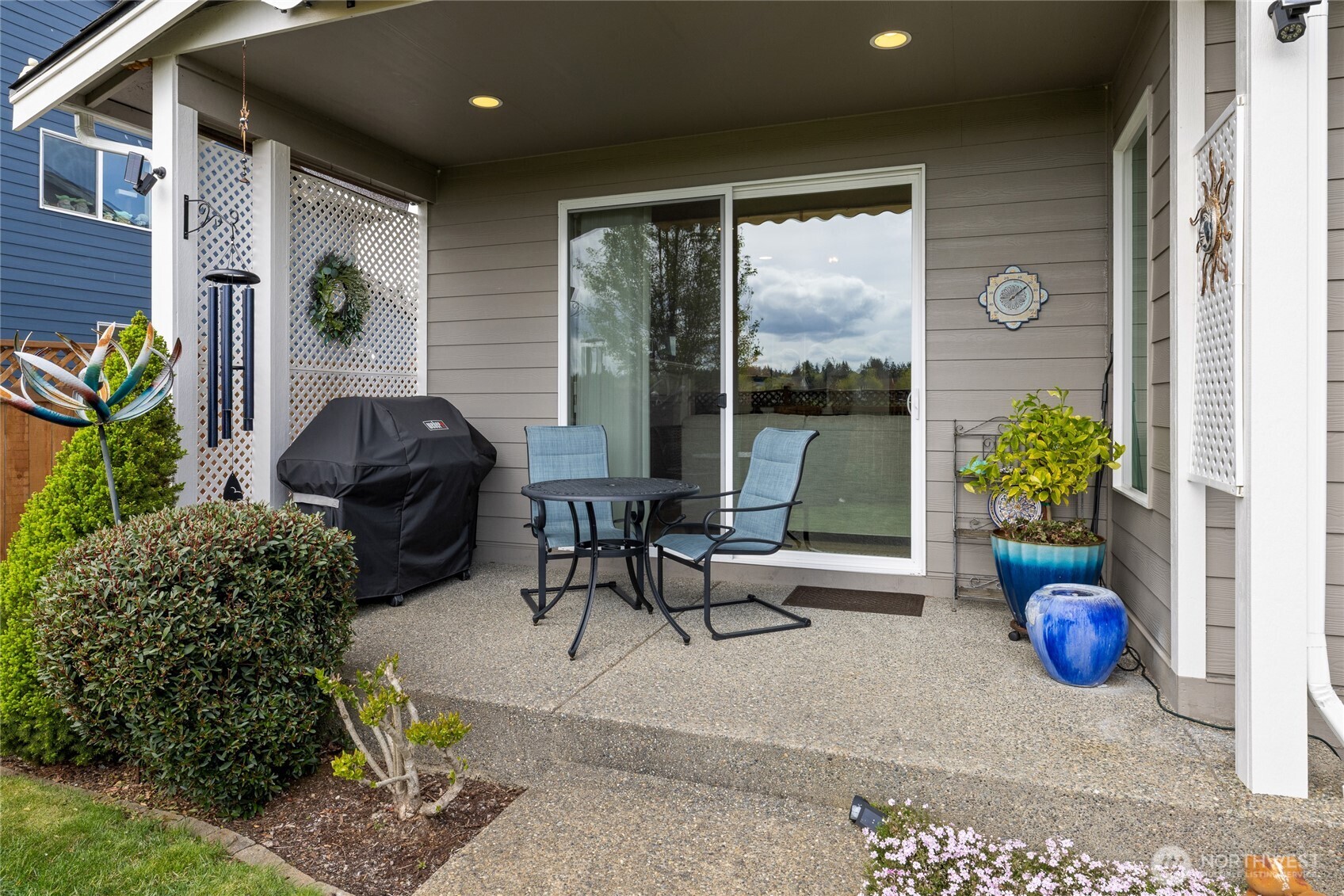 5641 Parquet Way Southeast Lacey, WA 98513 - Photo 34 of 39 a view of a porch with chairs and potted plants