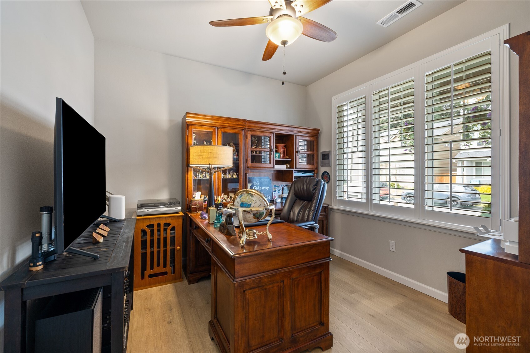 5641 Parquet Way Southeast Lacey, WA 98513 - Photo 5 of 39 a view of a workspace with furniture and a window