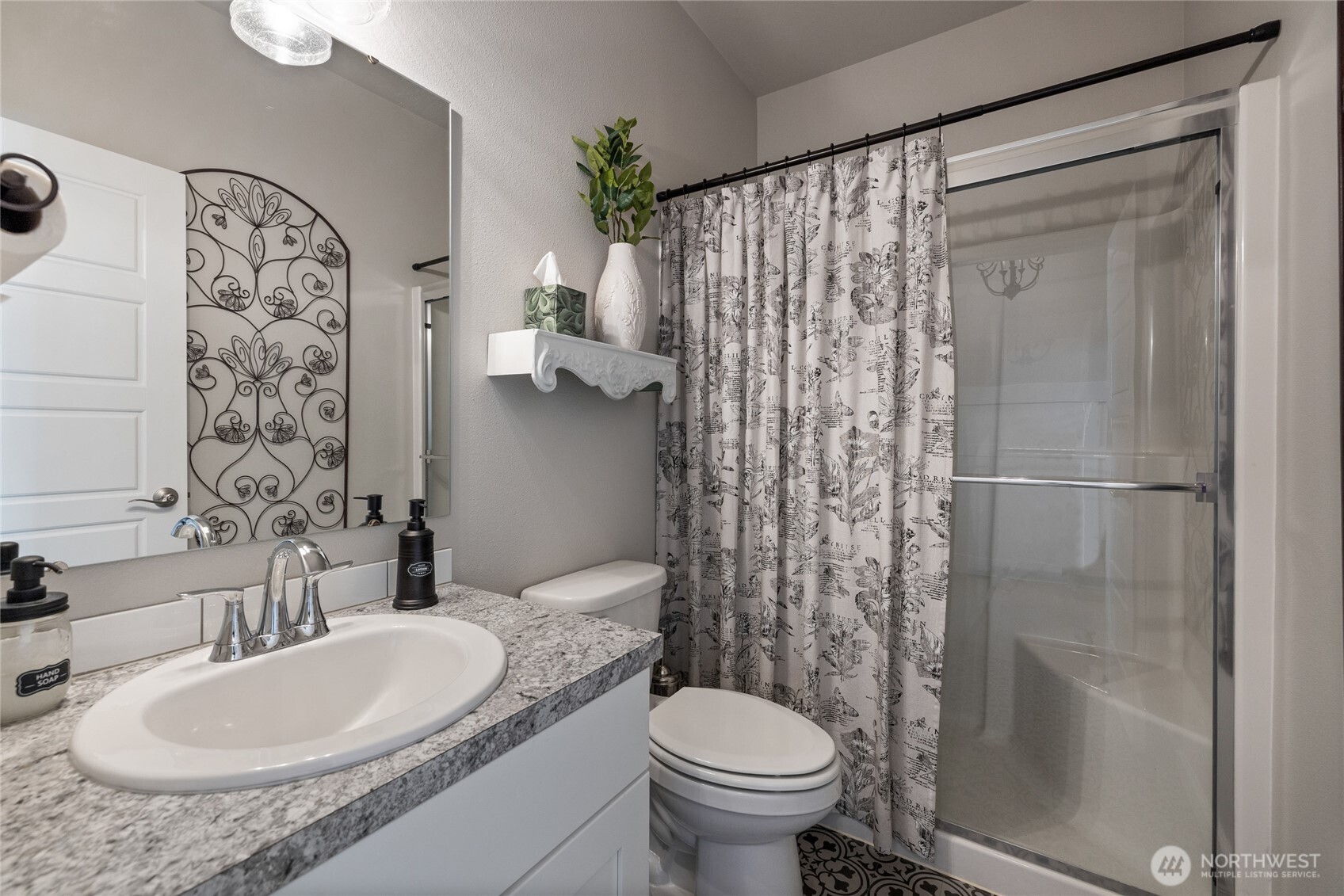 5641 Parquet Way Southeast Lacey, WA 98513 - Photo 8 of 39 a bathroom with a sink toilet and shower