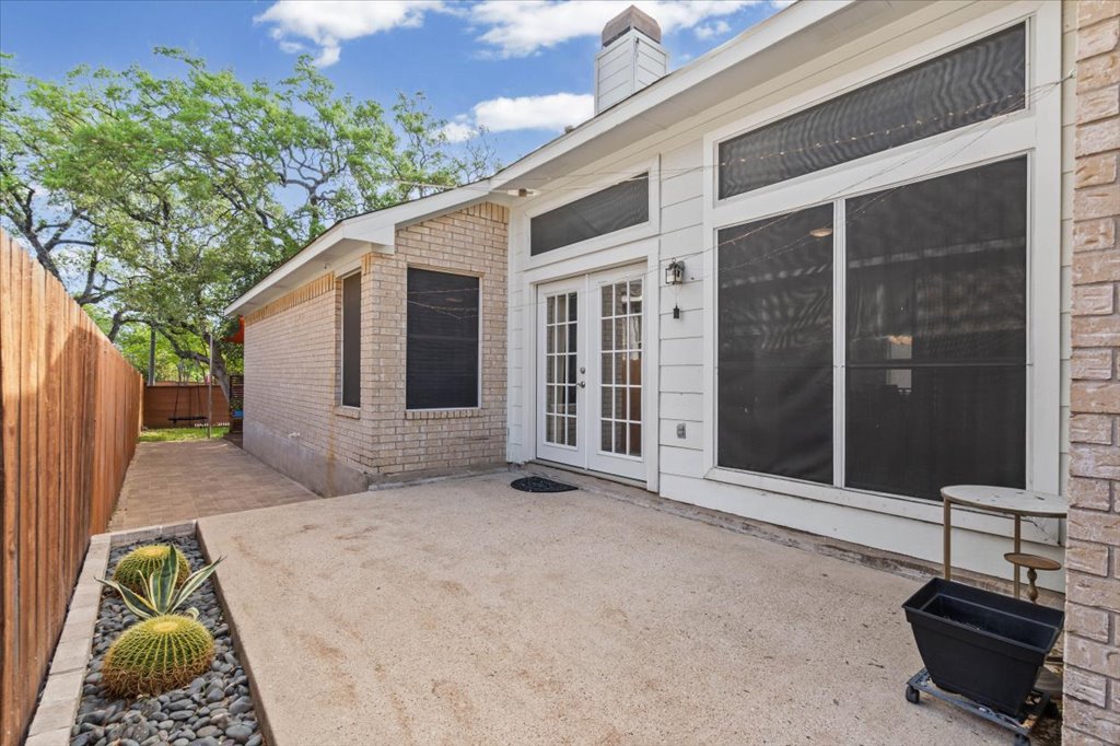 5948 Lomita Verde Circle Austin, TX 78749 - Photo 13 of 31 a front view of a house with a yard