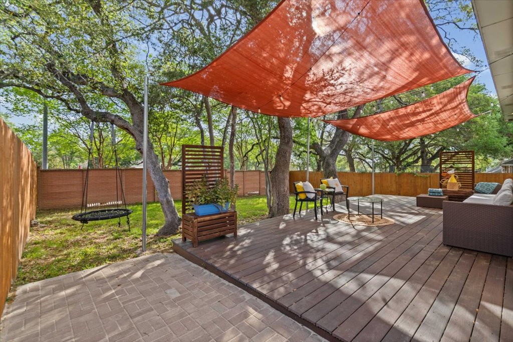 5948 Lomita Verde Circle Austin, TX 78749 - Photo 15 of 31 a view of a backyard with sitting area