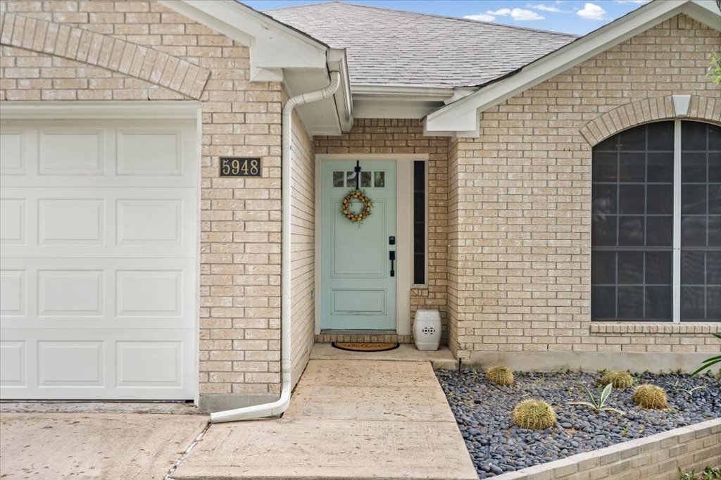 5948 Lomita Verde Circle Austin, TX 78749 - Photo 3 of 31 a front view of a house with a window