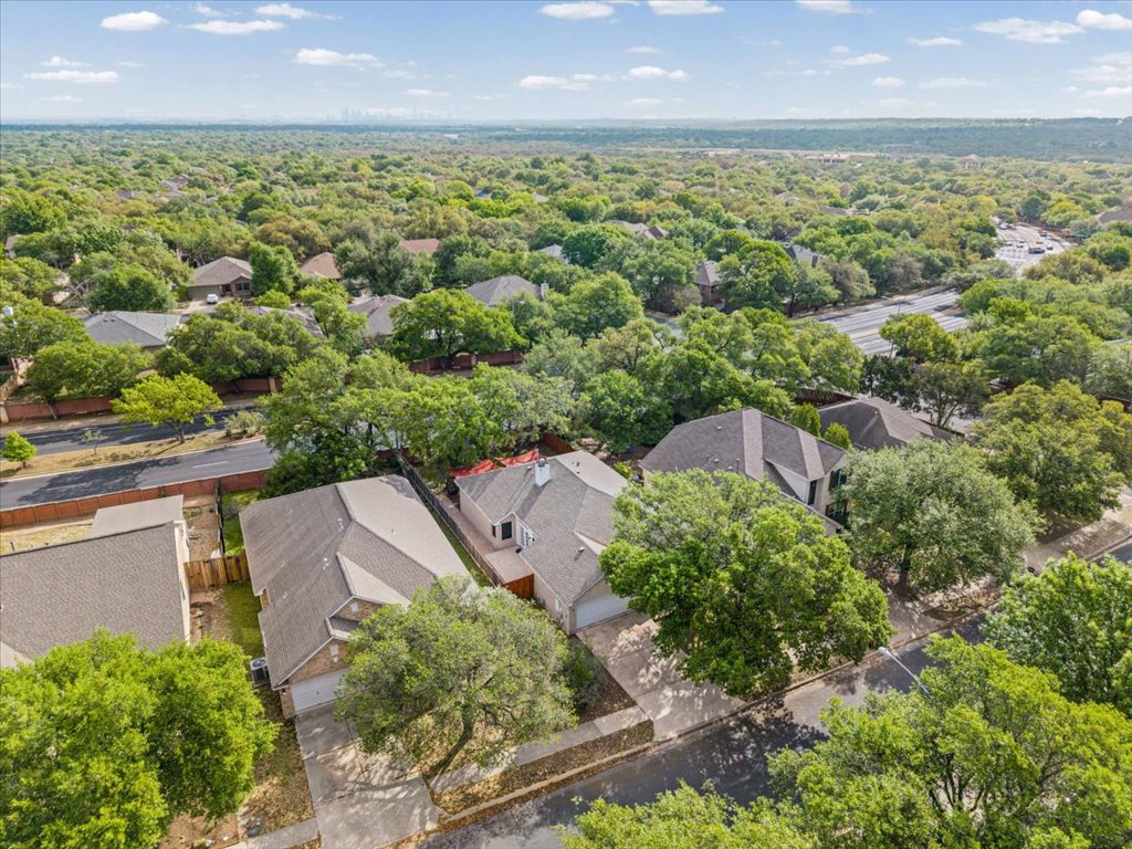 5948 Lomita Verde Circle Austin, TX 78749 - Photo 30 of 31 an aerial view of residential houses with outdoor space and trees all around