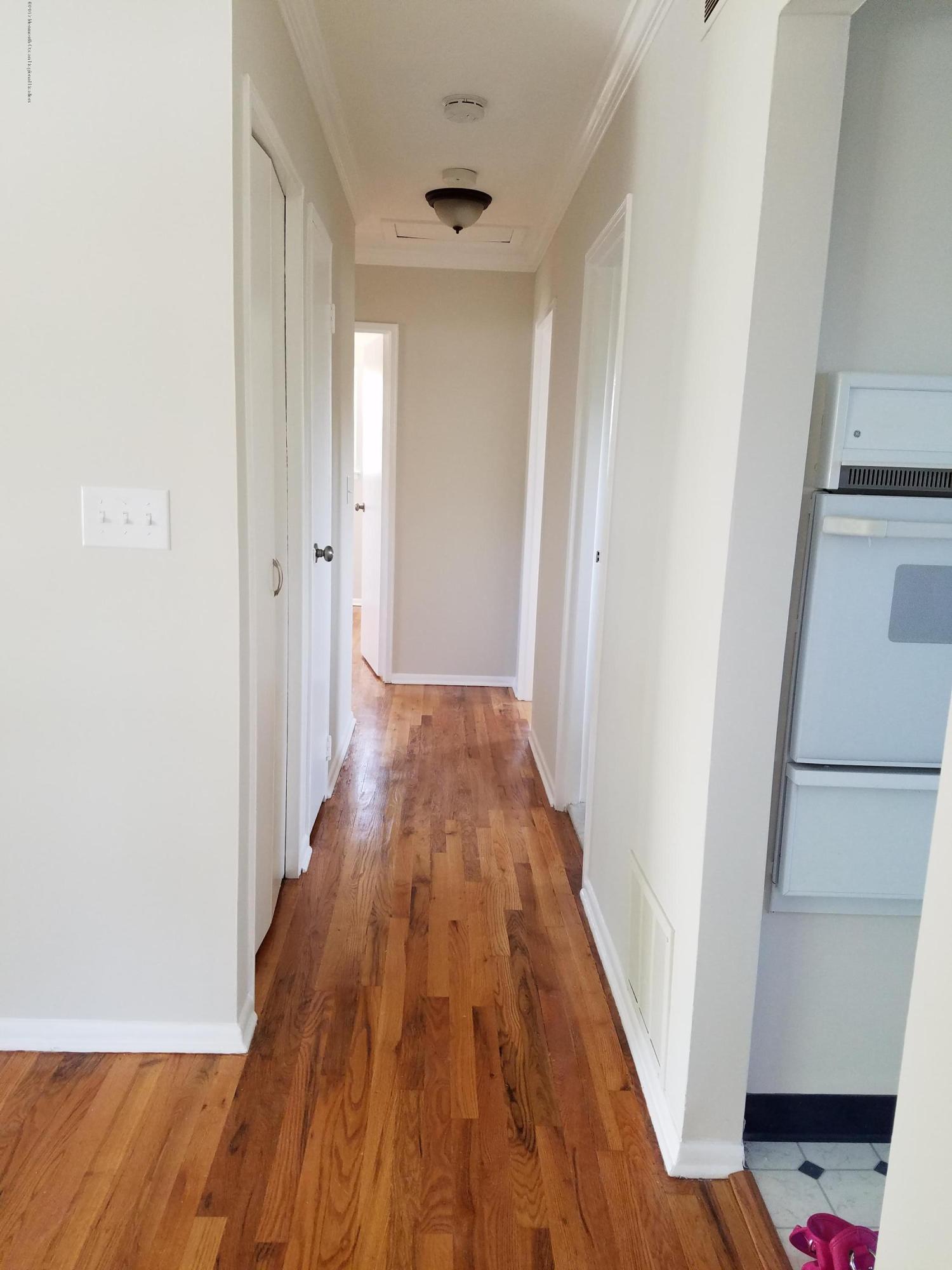 621 Marion Road Neptune Township, NJ 07753 - Photo 15 of 26 Hallway to bedrooms