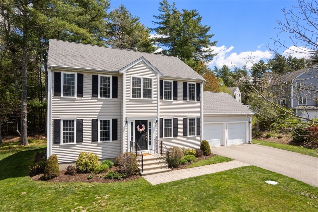 45 Cinnamon Ridge Circle Middleboro, MA 02346 - Photo 33 of 38 a front view of a house with a yard