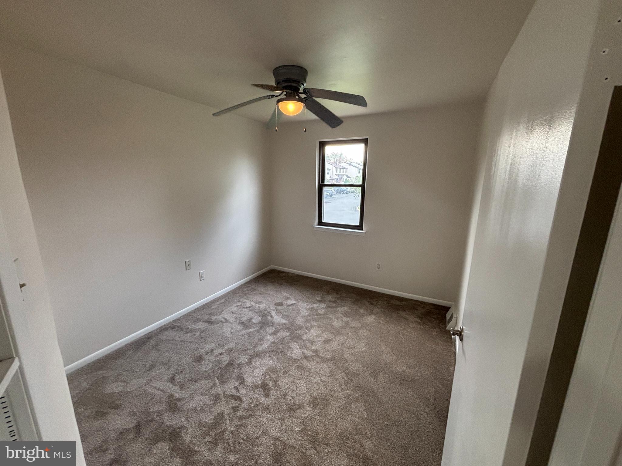 1460 Tarleton Place Warminster, PA 18974 - Photo 11 of 12 an empty room with windows and fan