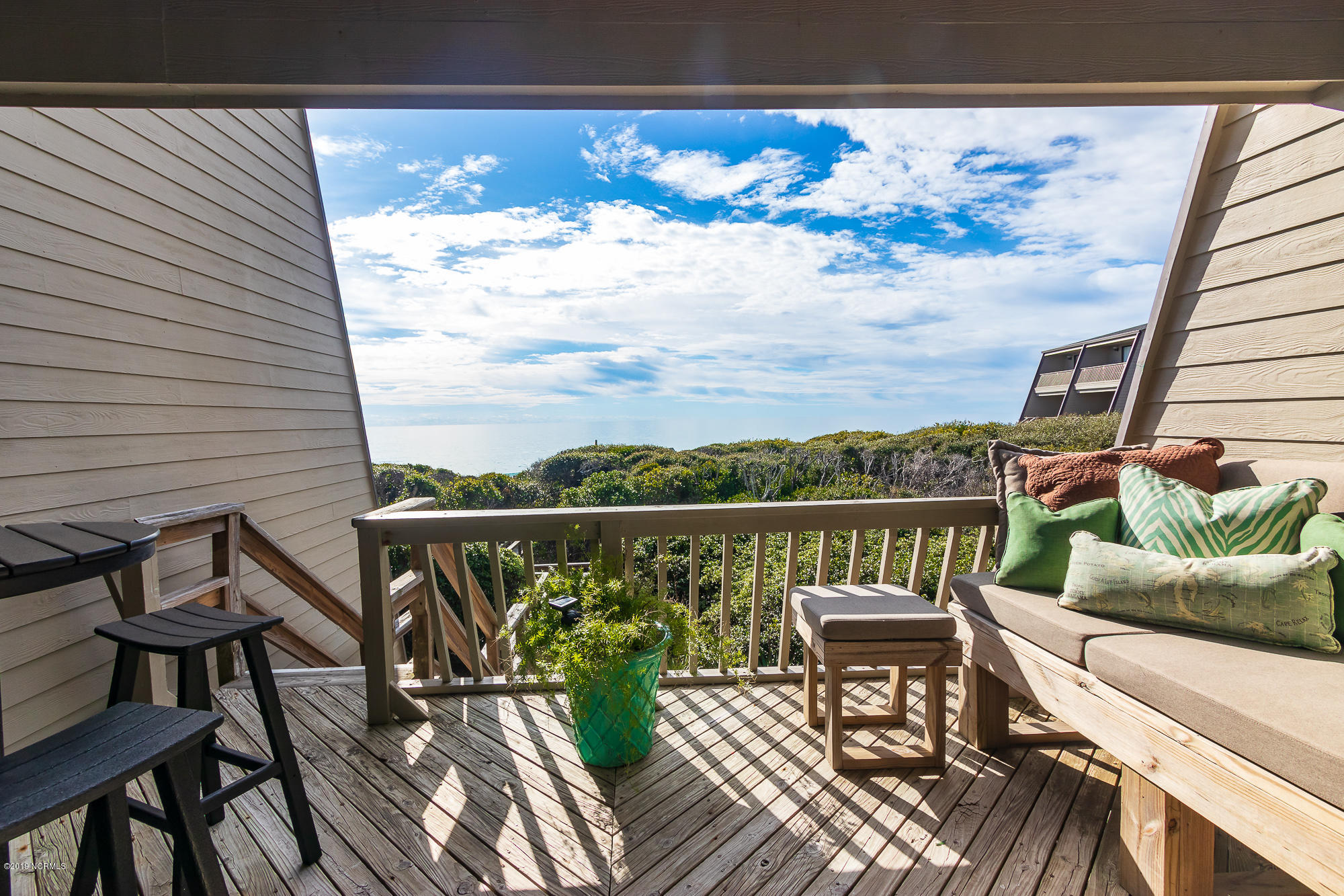 565 Salter Path Road, Unit X3 Pine Knoll Shores, NC 28512 - Photo 12 of 61 Cozy deck off living room