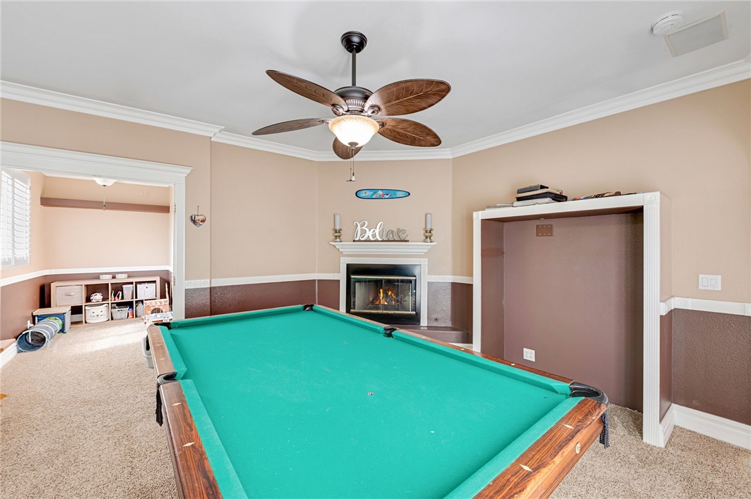 14396 Nautical Lane Helendale, CA 92342 - Photo 17 of 43 a living room with furniture and a fireplace