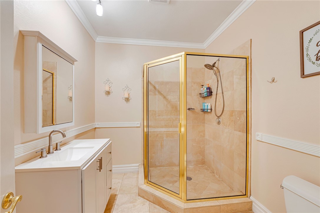 14396 Nautical Lane Helendale, CA 92342 - Photo 24 of 43 a bathroom with a shower sink and mirror