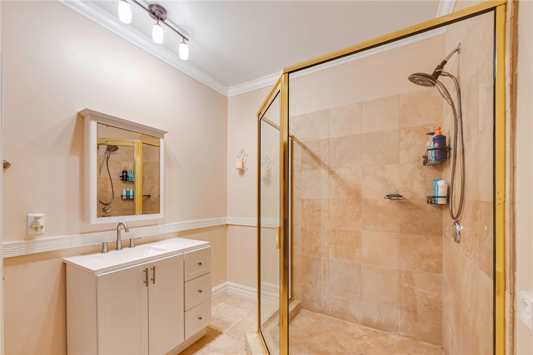 14396 Nautical Lane Helendale, CA 92342 - Photo 25 of 43 a bathroom with a double vanity sink mirror and shower