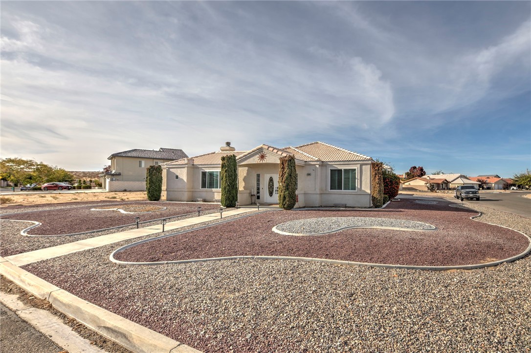 14396 Nautical Lane Helendale, CA 92342 - Photo 3 of 43 a house view with a garden space