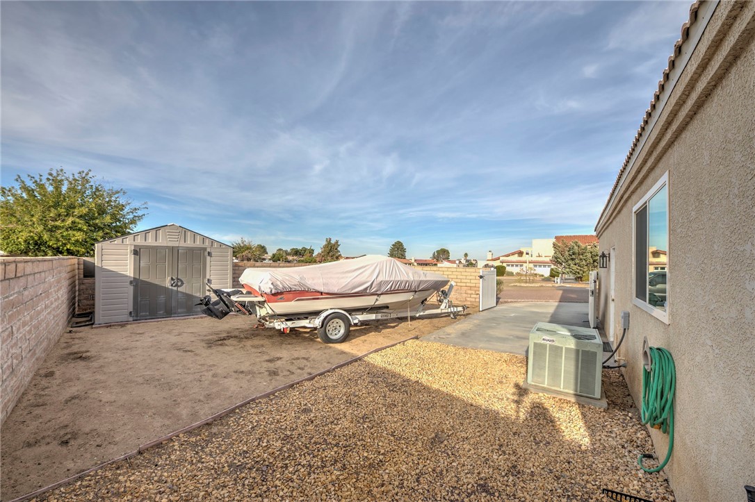 14396 Nautical Lane Helendale, CA 92342 - Photo 37 of 43 a view of a city street with a building