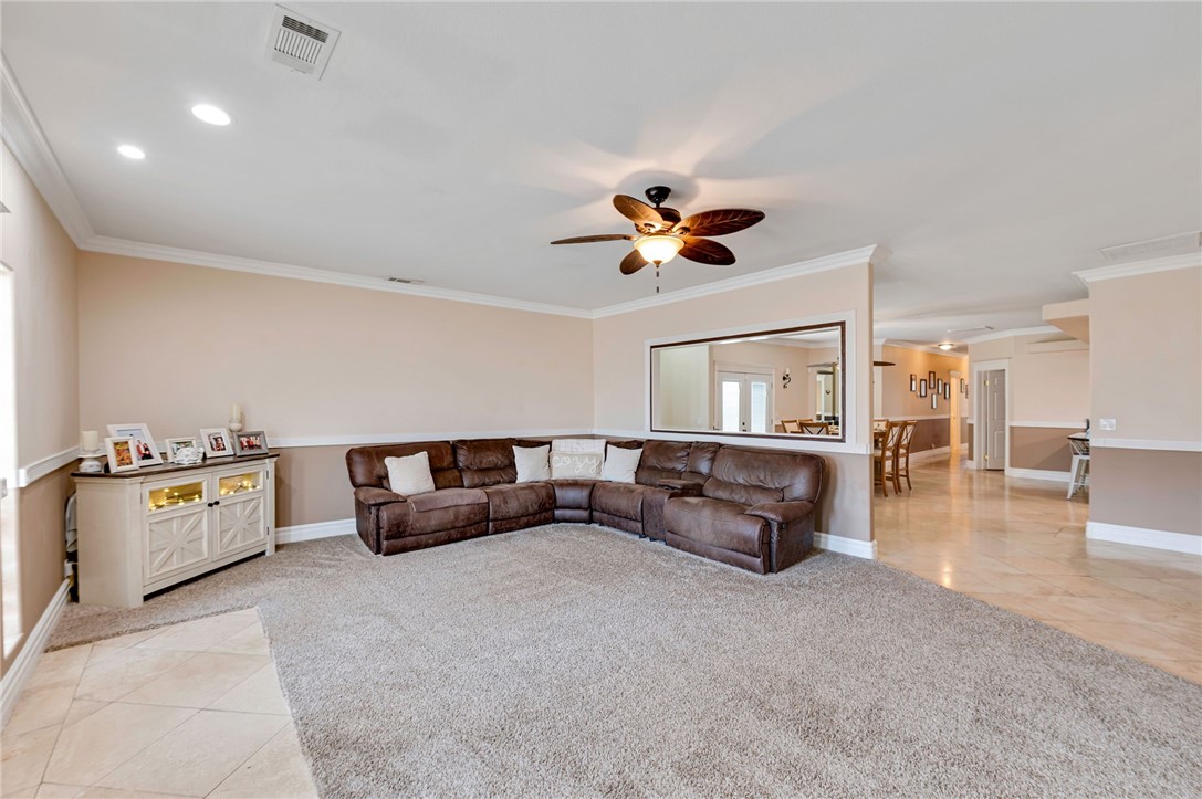 14396 Nautical Lane Helendale, CA 92342 - Photo 5 of 43 a living room with furniture and kitchen view