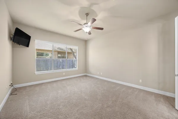a view of a kitchen with microwave and cabinets