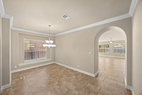a view of empty room with a window