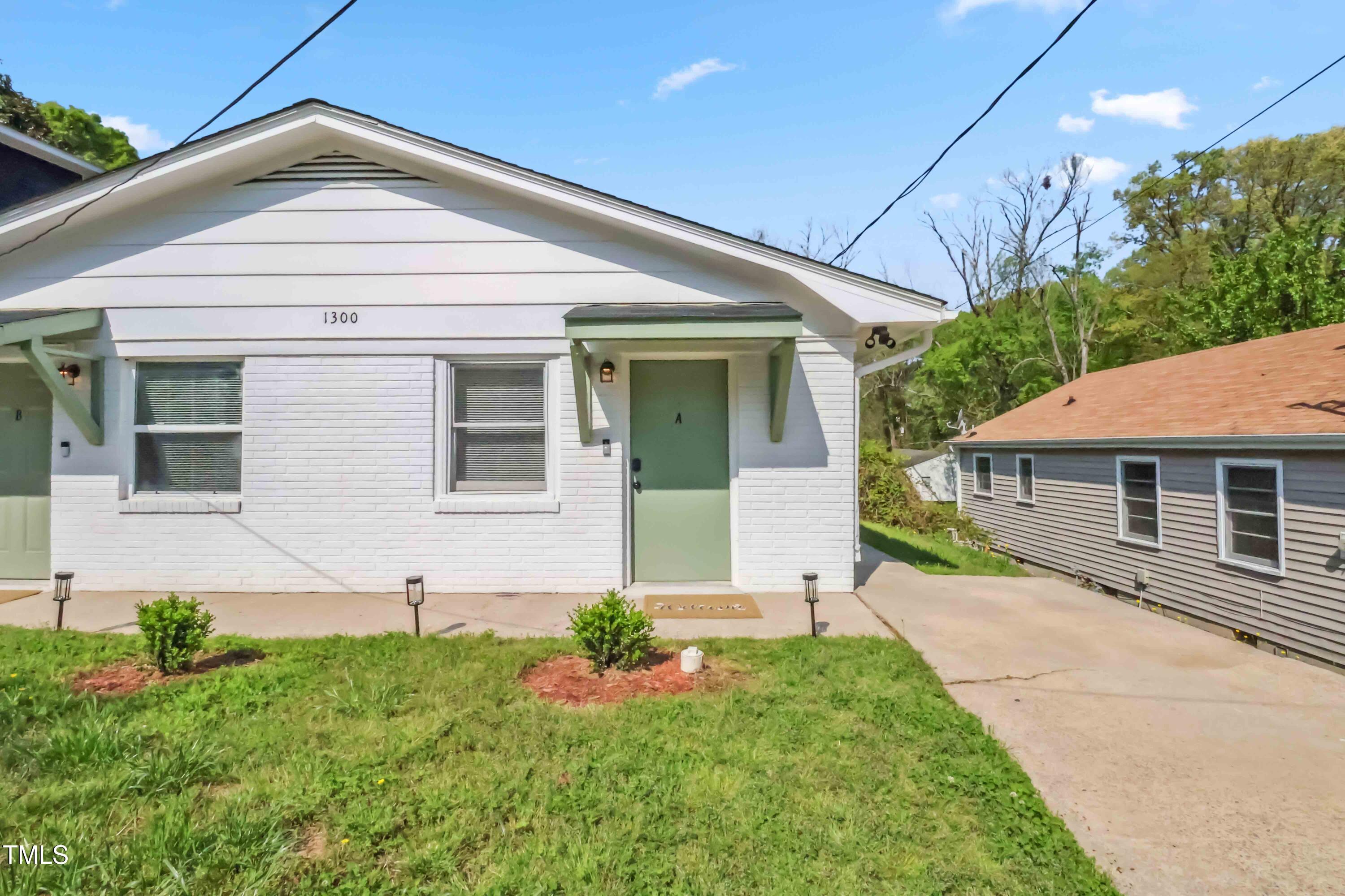 1300 South Street, Unit A Durham, NC 27707 - Photo 10 of 10 a front view of a house with garden