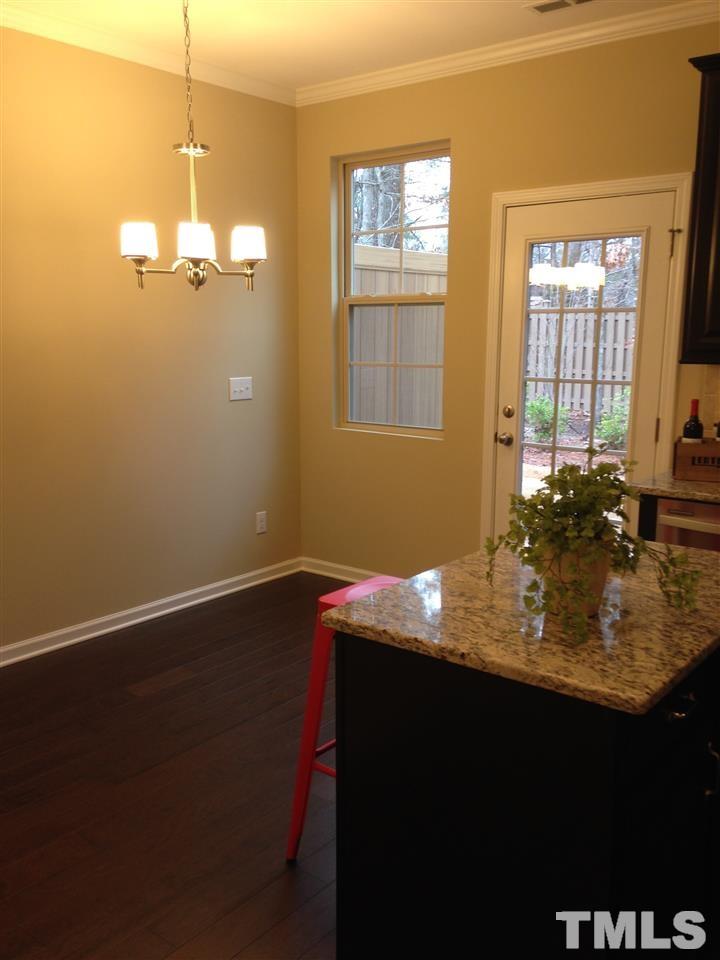 682 Wickham Ridge Road, Unit 145 Apex, NC 27539 - Photo 7 of 25 a room with pool table and windows