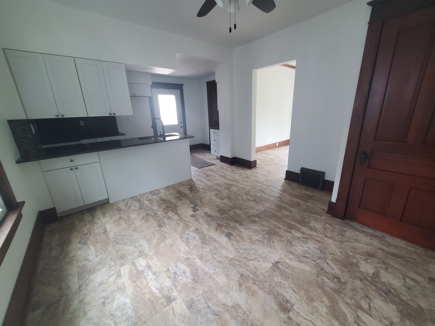 712 3rd Street Moline, IL 61265 - Photo 17 of 29 a kitchen with sink and cabinets