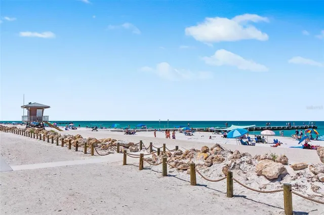 a blue sign that is on the side of a building