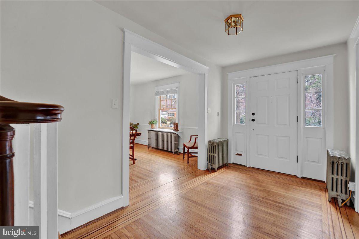 209 Hewett Road Wyncote, PA 19095 - Photo 17 of 36 a view of a livingroom with wooden floor and furniture