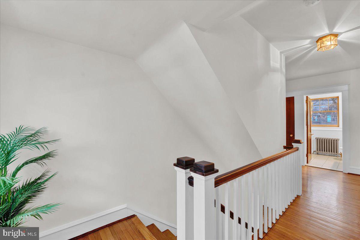 209 Hewett Road Wyncote, PA 19095 - Photo 19 of 36 a view of a hallway with wooden floor