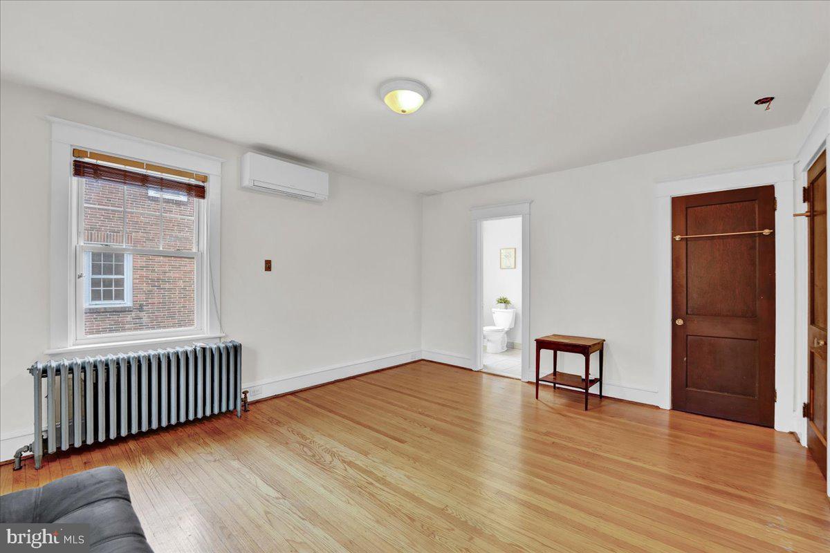 209 Hewett Road Wyncote, PA 19095 - Photo 22 of 36 wooden floor in an empty room with a window