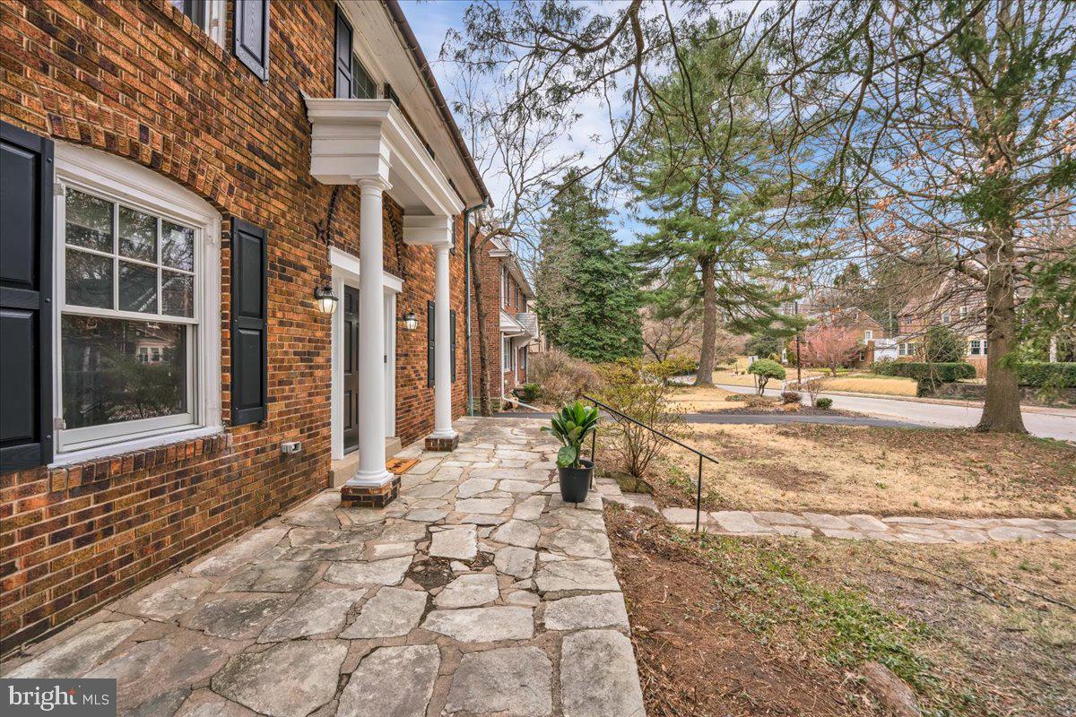 209 Hewett Road Wyncote, PA 19095 - Photo 3 of 36 a pathway of a house with a yard