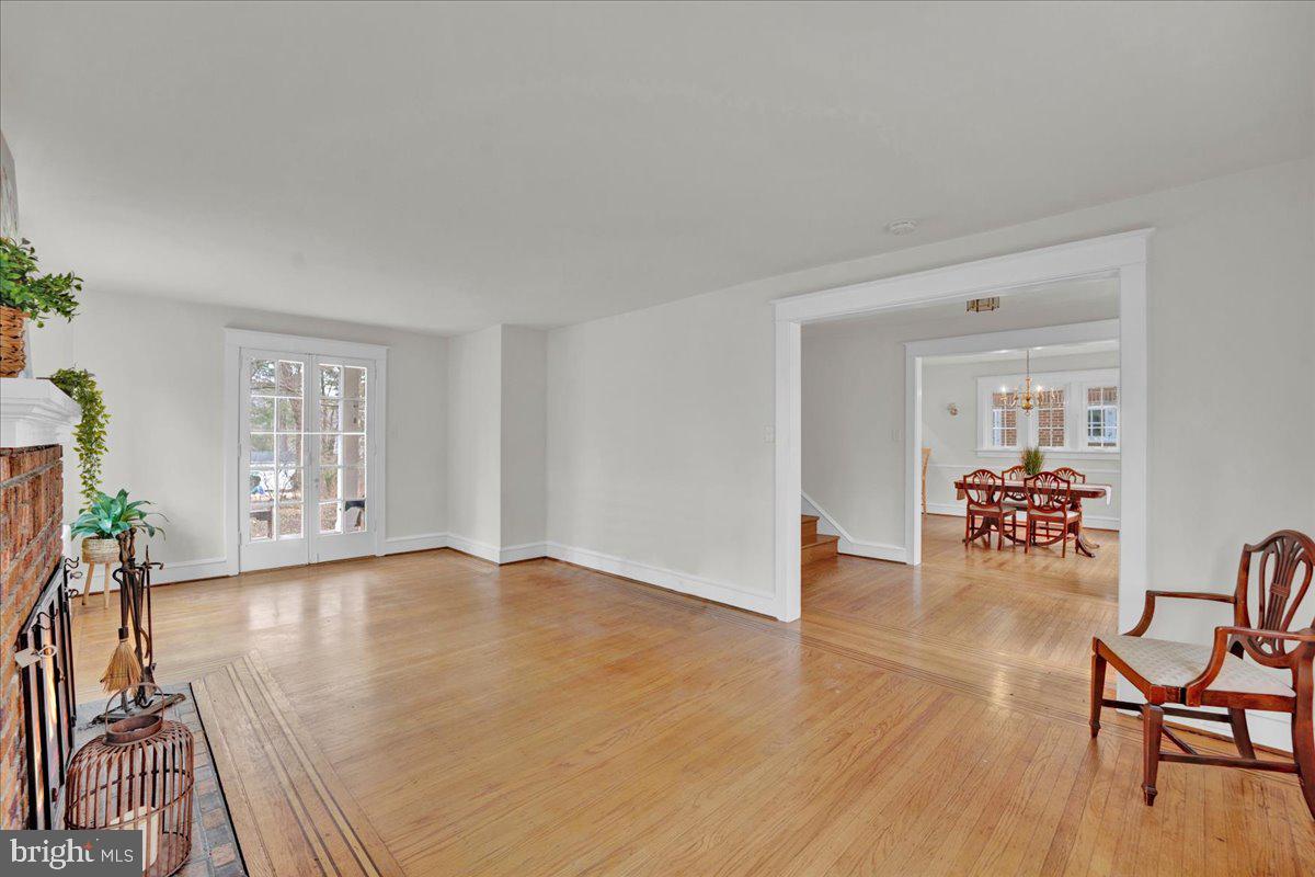 209 Hewett Road Wyncote, PA 19095 - Photo 7 of 36 a view of livingroom with hardwood floor and furniture