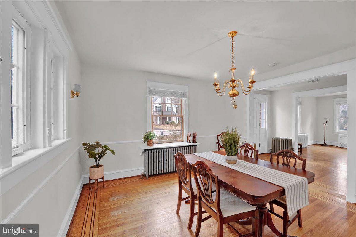 209 Hewett Road Wyncote, PA 19095 - Photo 10 of 36 a view of a dining room with furniture window and wooden floor