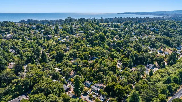 an aerial view of a city with lots of residential buildings