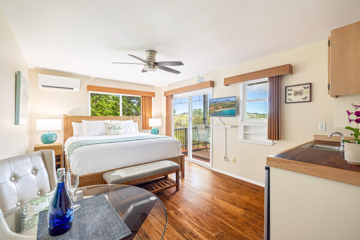 3307 D Hailima Road Koloa, HI 96756 - Photo 16 of 30 a living room with furniture and a table